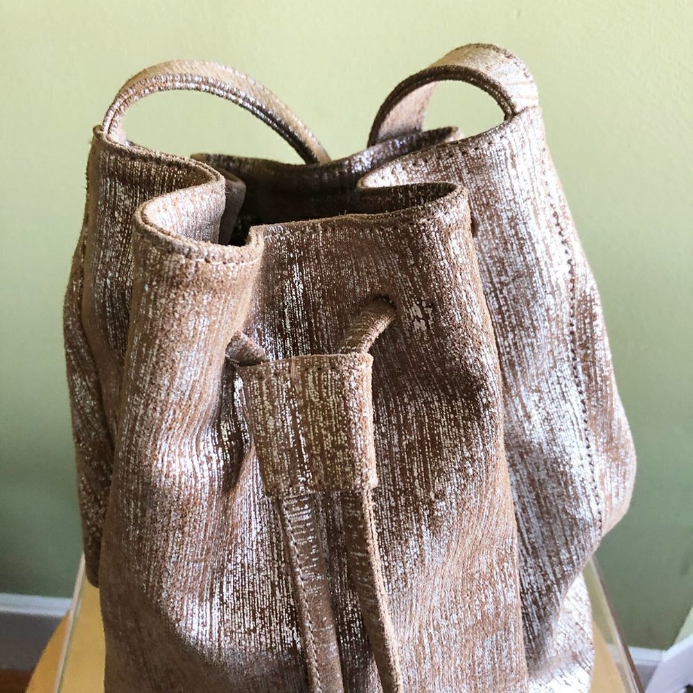 Marie Turnor Neutral Metallic Textured Drawstring Bucket Bag